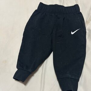 Nike Kids Black Jogger Pants with White Swoosh